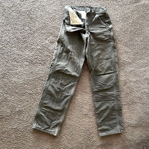 Carhartt brand, plaid lined work pants size 29 x 32 long